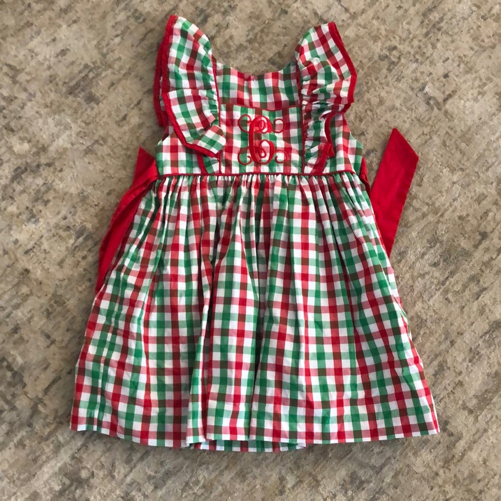 Christmas dress with letter C monogram. Kelly’s Kids